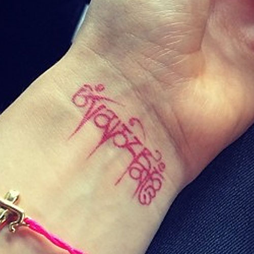 ellie-goulding-tibetan-wrist-tattoo-