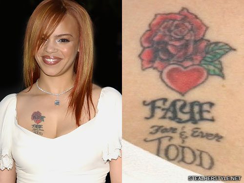 Faith Evans 46 shows off her huge rose tattoo in plunging red glitter  gown  Daily Mail Online