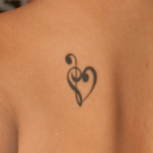 Black Music Note And Heart Tattoo On Side Rib