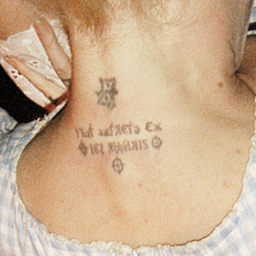 Invictus Latin tattoo, meaning 