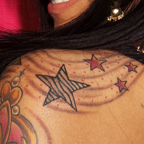 stars and swirls tattoos on shoulder