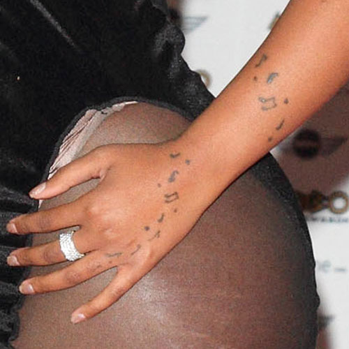 K. Michelle Music Notes Back of Hand, Forearm Tattoo | Steal Her Style