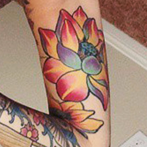 Allison Green lotus arm tattoo