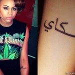Amira McCarthy arabic elbow tattoo