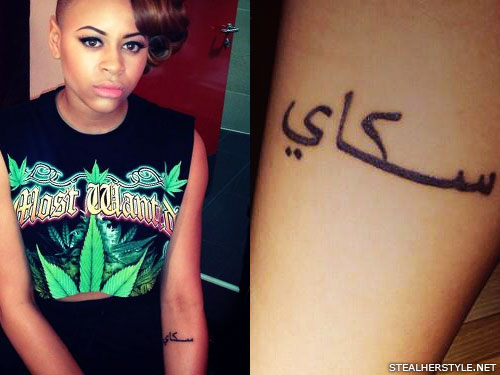 Amira McCarthy arabic elbow tattoo