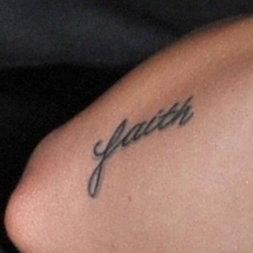 demi-lovato-faith-elbow-tattoo