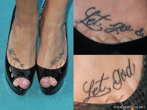 Tattoo that says let go let God handwritten on the