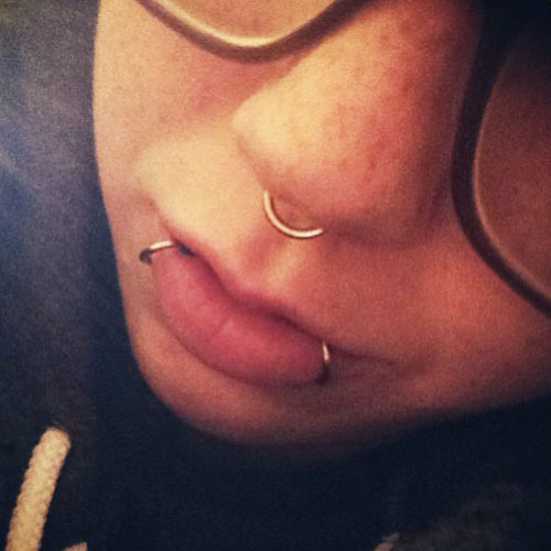 Septum and sales lip piercing