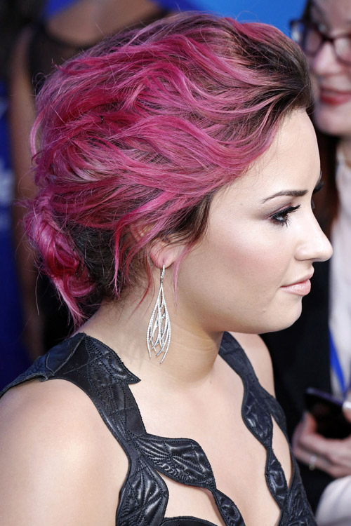 Demi Lovato Wavy Pink Bun Dark Roots Updo Hairstyle Steal Her Style