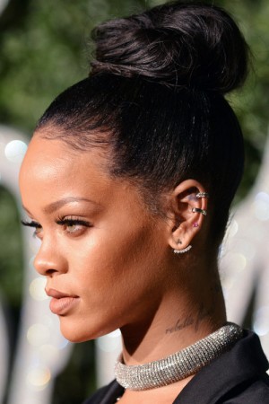 Rihanna Straight Black Bun Hairstyle | Steal Her Style