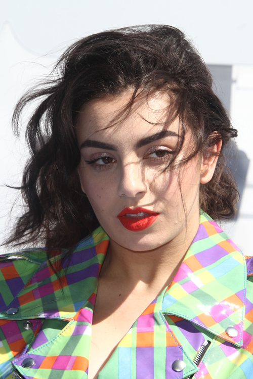 Charli XCX Wavy Dark Brown Messy Hairstyle | Steal Her Style