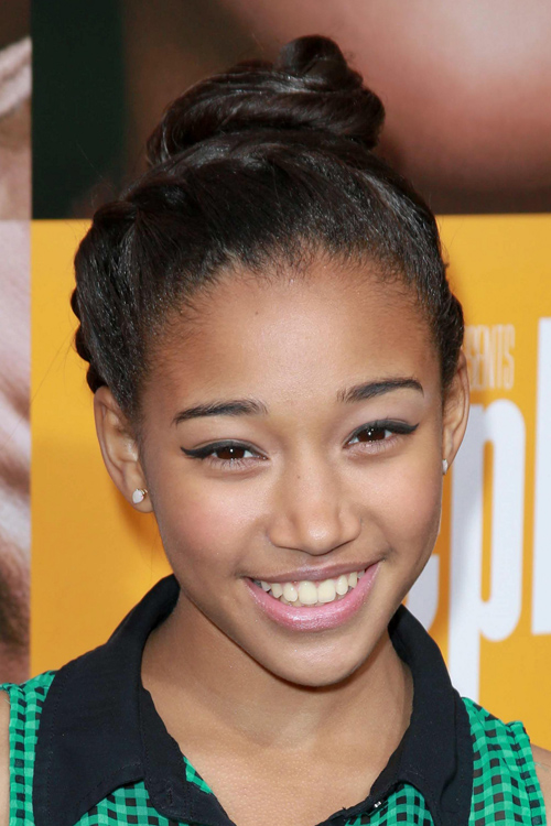 Amandla Stenberg Curly Dark Brown Bun, Crown Braid Hairstyle | Steal ...