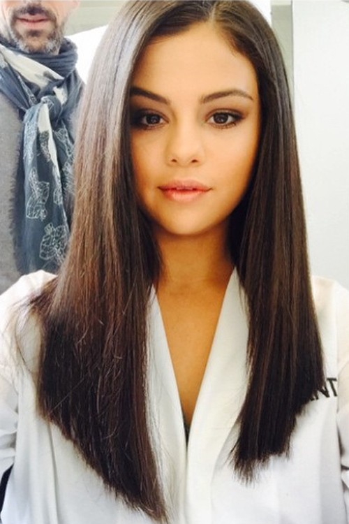 Selena Gomez's long hair with sides that frame the face