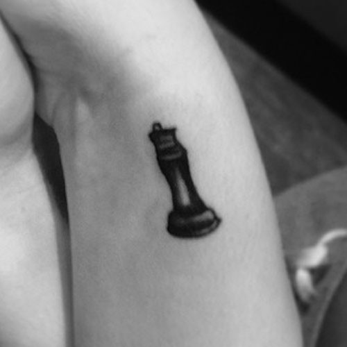 white queen chess piece tattoo