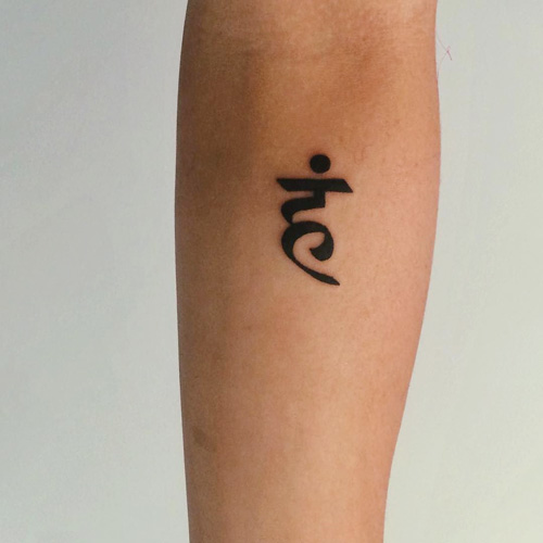 Nia Lovelis Vishuddha Chakra Forearm Tattoo | Steal Her Style