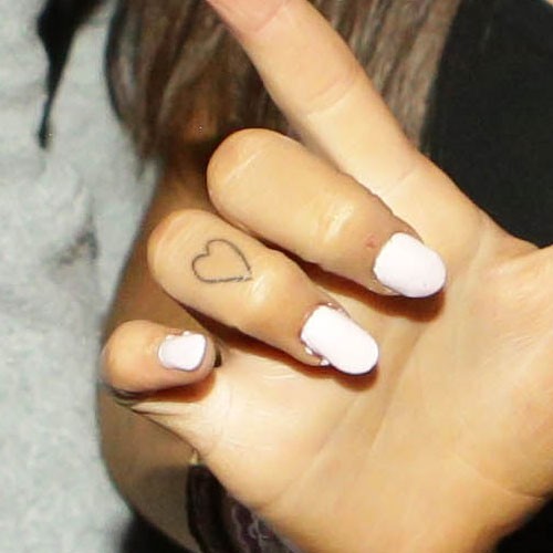 Ariana Grande S 17 Tattoos Meanings Steal Her Style Page 2