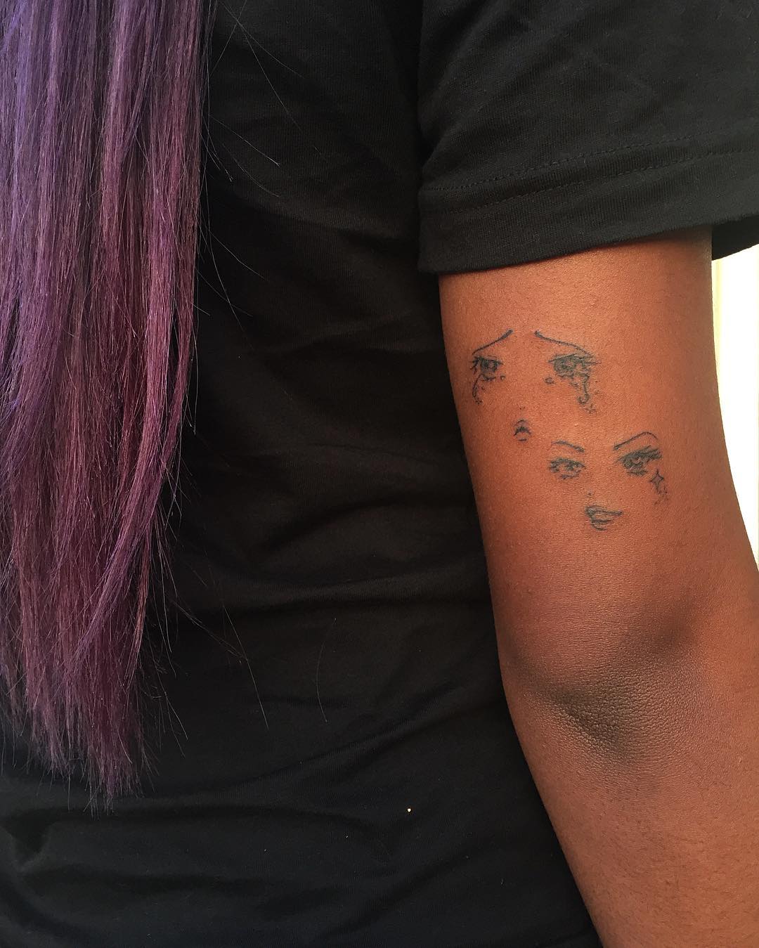Justine Skye Mask Upper Arm Tattoo | Steal Her Style