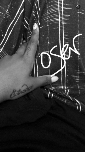 Justine Skye Writing Side of Hand Tattoo | Steal Her Style