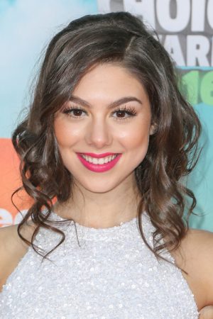 Kira Kosarin Wavy Medium Brown Barrel Curls Hairstyle | Steal Her Style