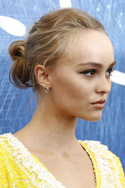 Lily Rose Depp Straight Light Brown Bun Hairstyle | Steal Her Style