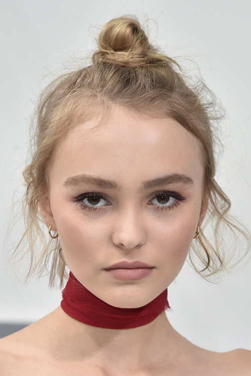 Lily Rose Depp Wavy Light Brown Bun Hairstyle | Steal Her Style