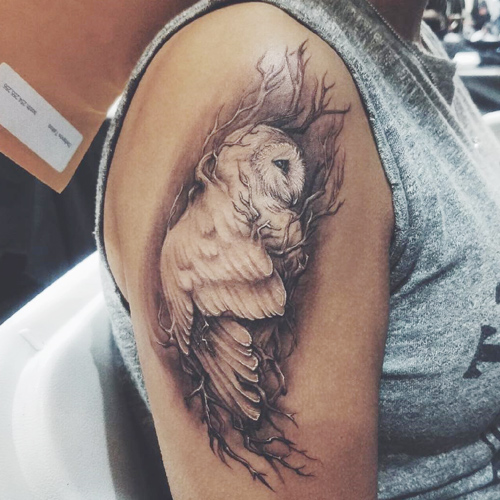 barn owl tattoo on arm