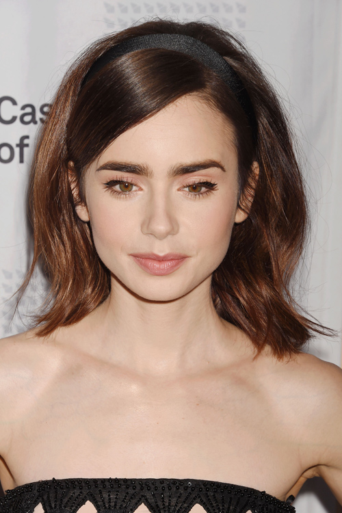 Lily Collins Straight Dark Brown Headband Hairstyle | Steal Her Style