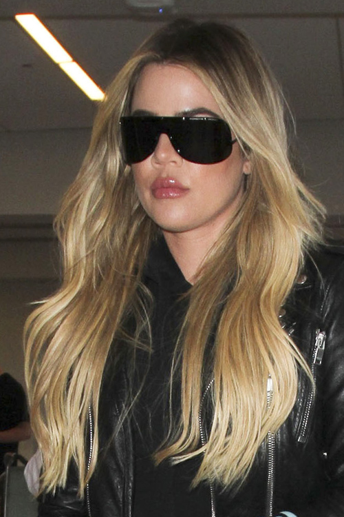 Khloe Kardashian Wavy Light Brown All-Over Highlights Hairstyle | Steal ...
