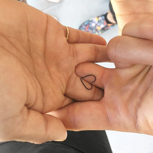 heart finger tattoo