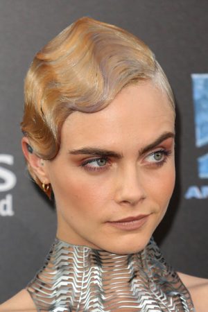Cara Delevingne's Hairstyles & Hair Colors | Steal Her Style