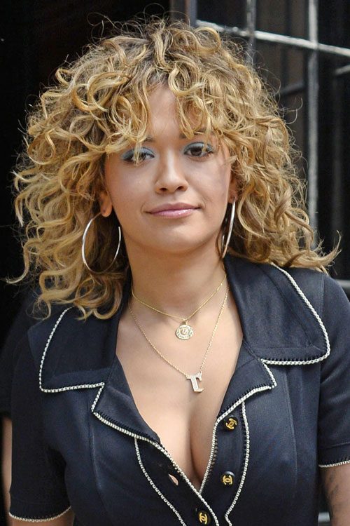 Rita Ora Curly Medium Brown Choppy Layers Hairstyle | Steal Her Style