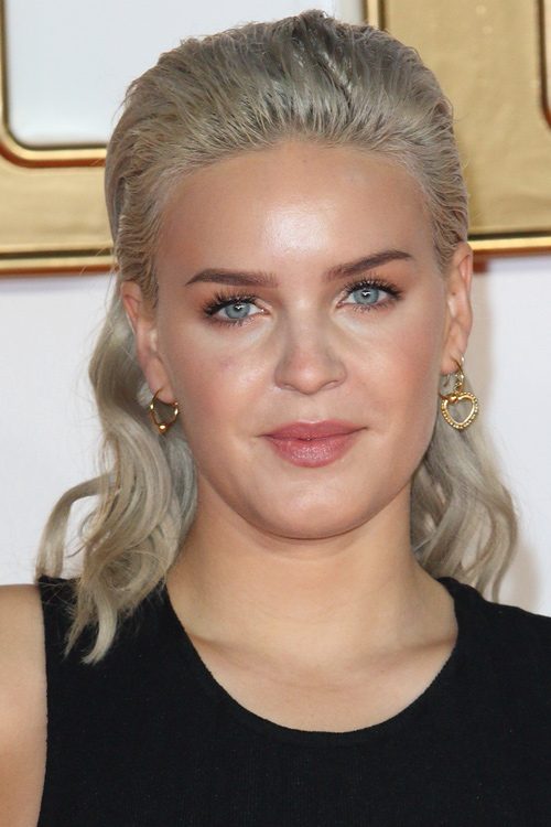 Anne-Marie Wavy Slicked Back Hairstyle | Steal Her Style