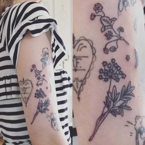 Marzia Bisognin Flowers Upper Arm Tattoo | Steal Her Style