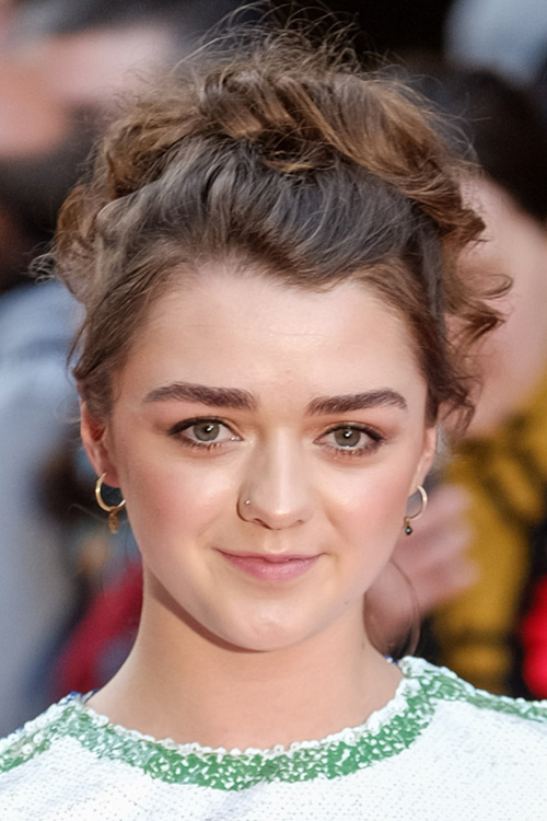 Maisie Williams Wavy Medium Brown Updo Hairstyle | Steal Her Style