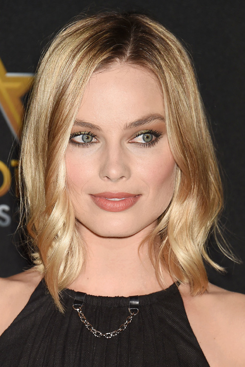 Margot Robbie Wavy Honey Blonde Barrel Curls Hairstyle | Steal Her Style