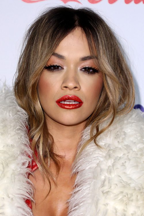Rita Ora Wavy Medium Brown All-Over Highlights, Loose Waves, Two-Tone  Hairstyle | Steal Her Style