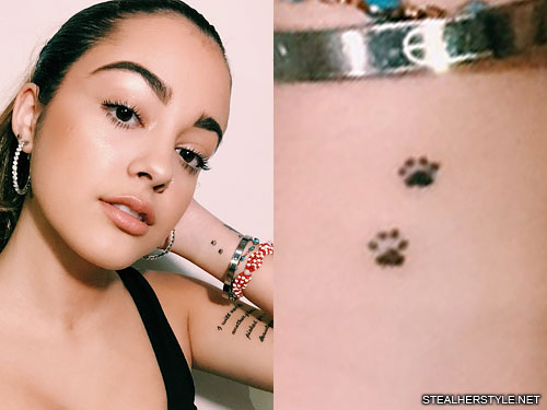 dog paw print tattoo on wrist