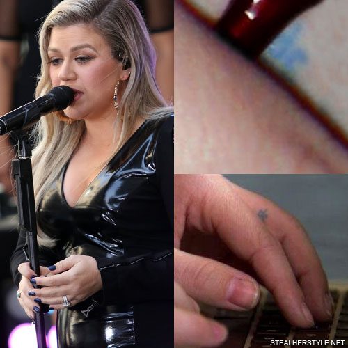 Demi Lovato ME Finger Tattoo