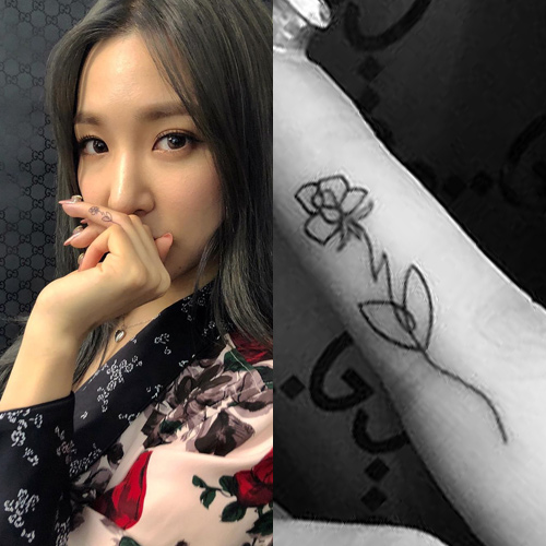 Tiffany Young Flower Finger Tattoo | Steal Her Style.
