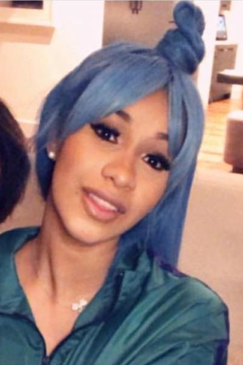 Cardi B Managed to Make Uneven Bangs and Extra-Long Sideburns Look