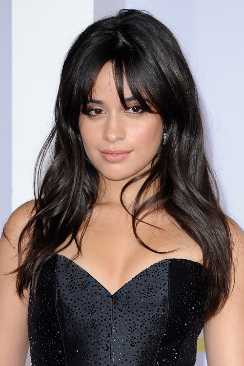 Camila Cabello Wavy Dark Brown Overgrown Bangs Hairstyle | Steal Her Style