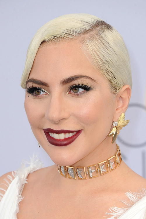 Lady Gaga Straight Platinum Blonde Dark Roots, Updo Hairstyle | Steal