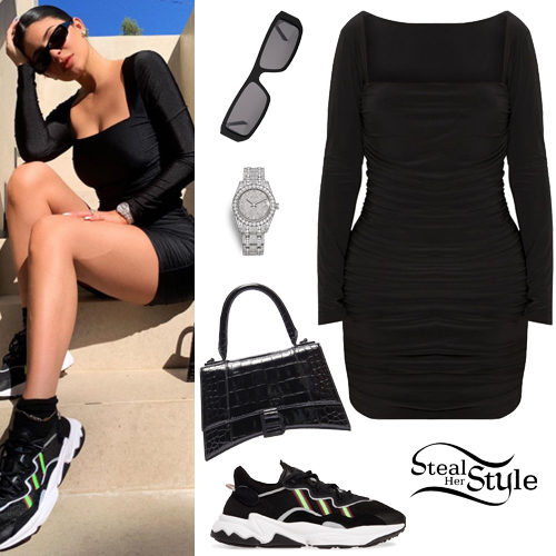 black dress and sneakers