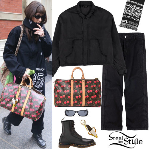 Bella Hadid in black bomber jacket with cherry print duffel bag in Milan on  January 13 ~ I want her style - What celebrities wore and where to buy it.  Celebrity Style