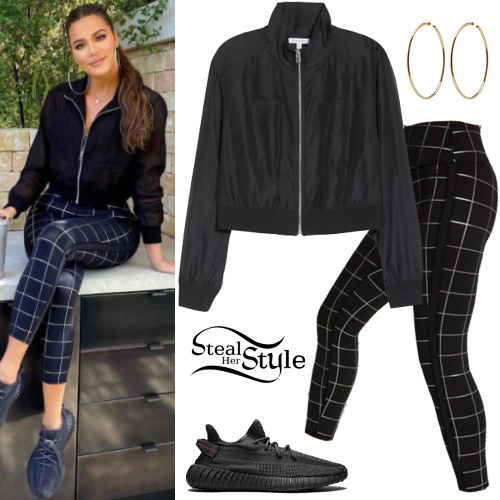 Khloe Kardashian braless under black bomber jacket in LA