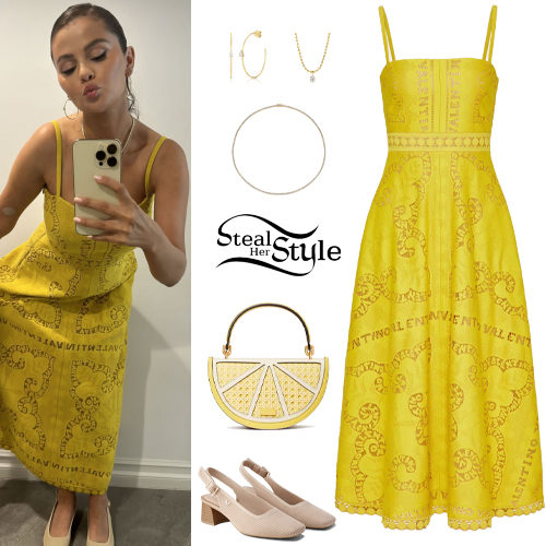 Selena Gomez Introduces “Lemon Girl Summer” In a Yellow Midi Dress