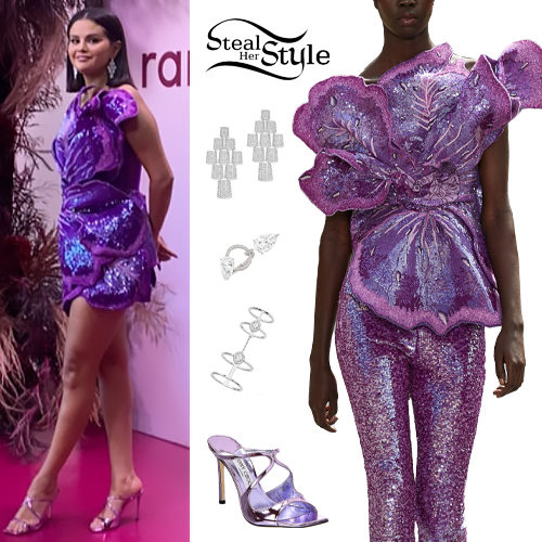 Selena Gomez makes a stylish arrival in a printed mini-dress at